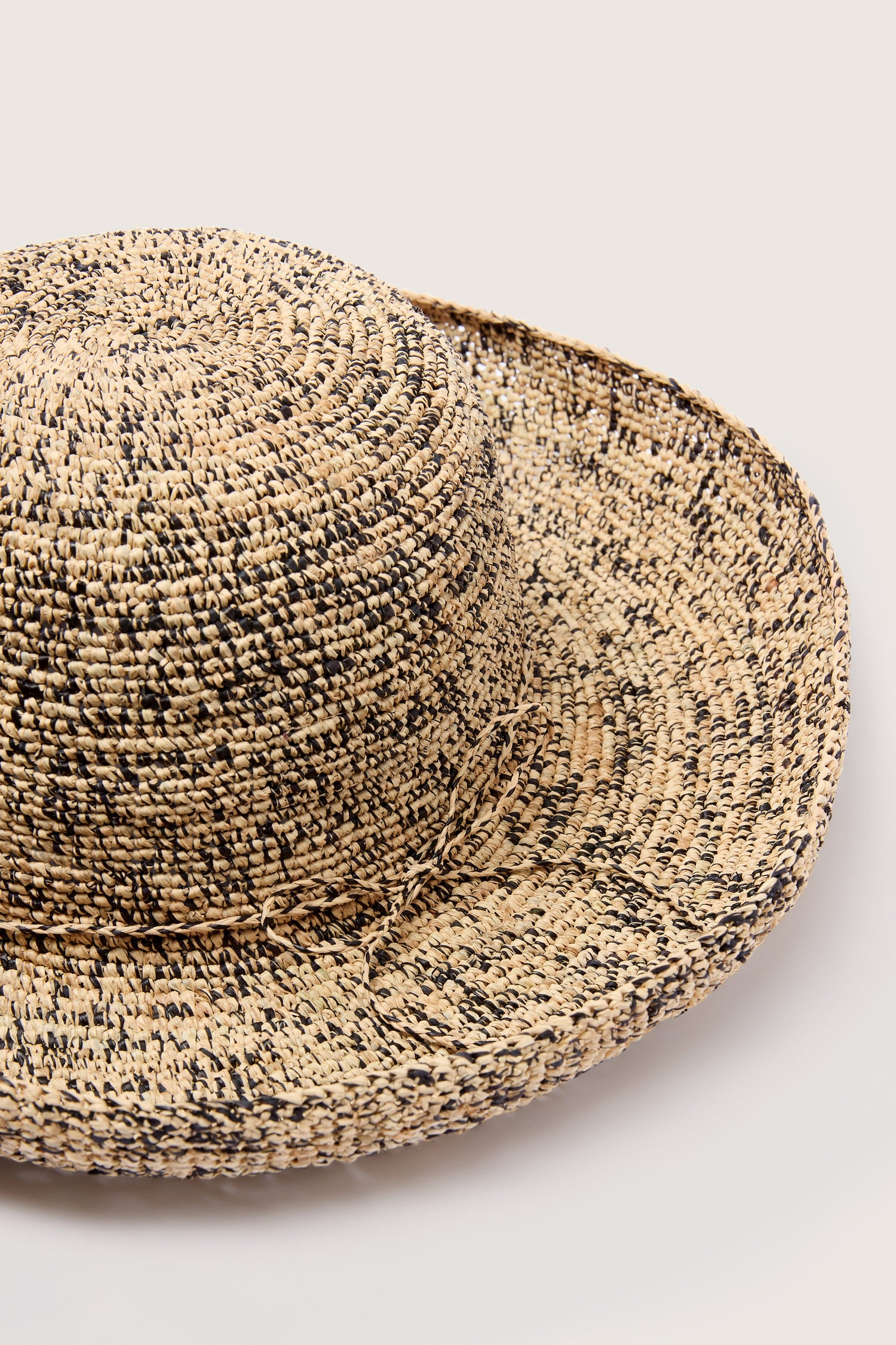 Wide Brim Woven Raffia Hat against a white background.