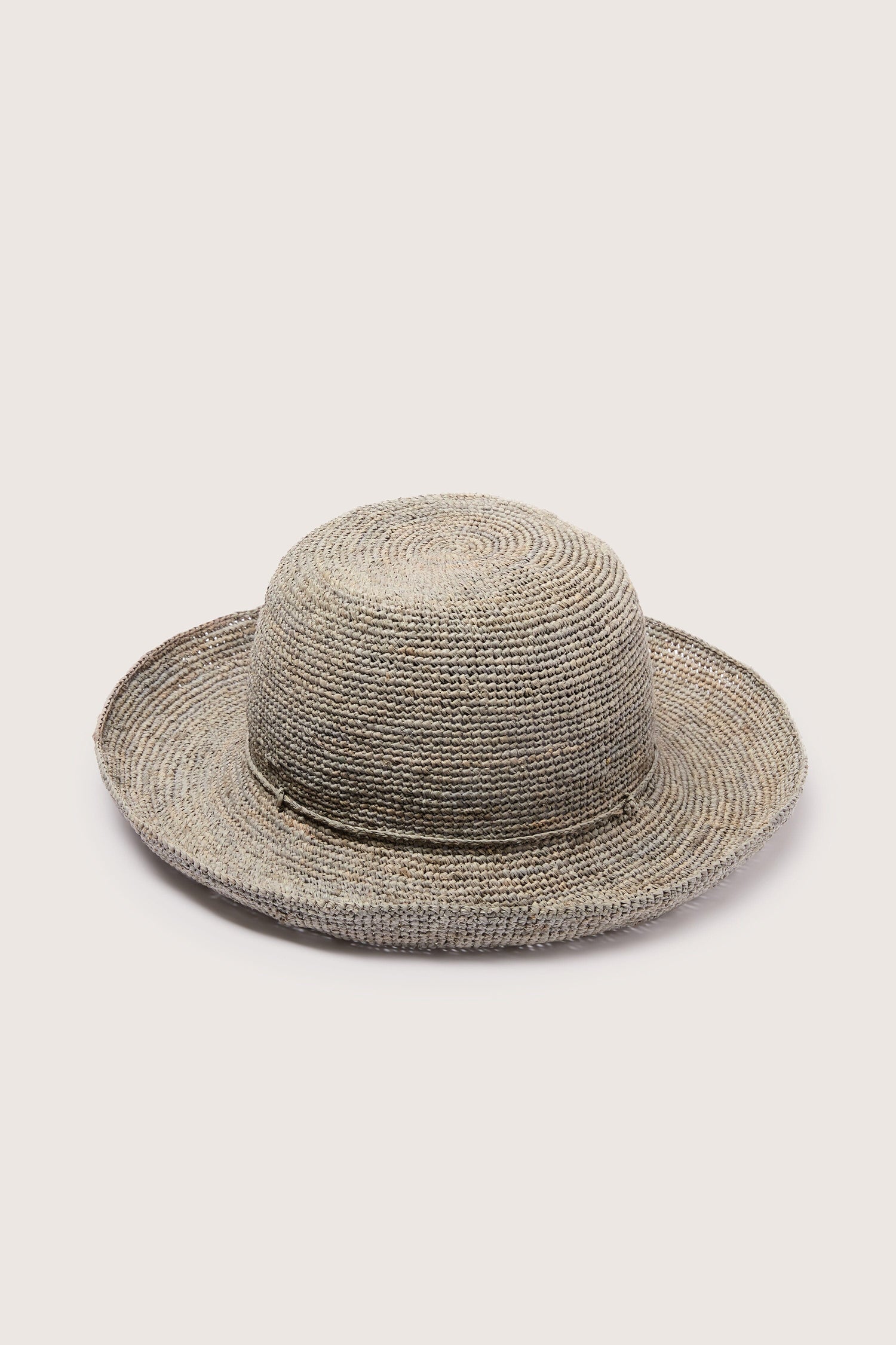 A Woven Raffia Hat on a white background.