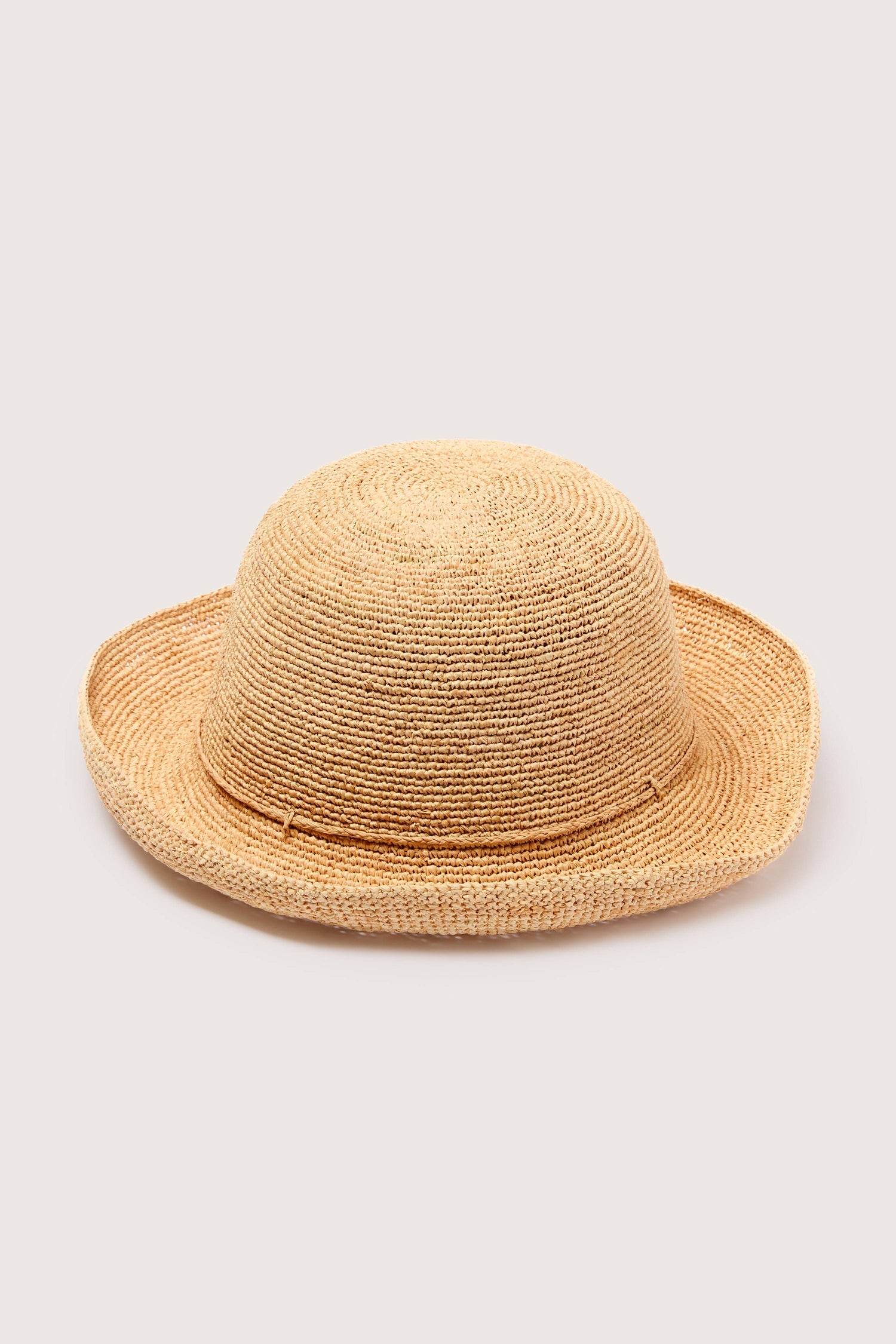 A Woven Raffia Hat isolated on a white background.