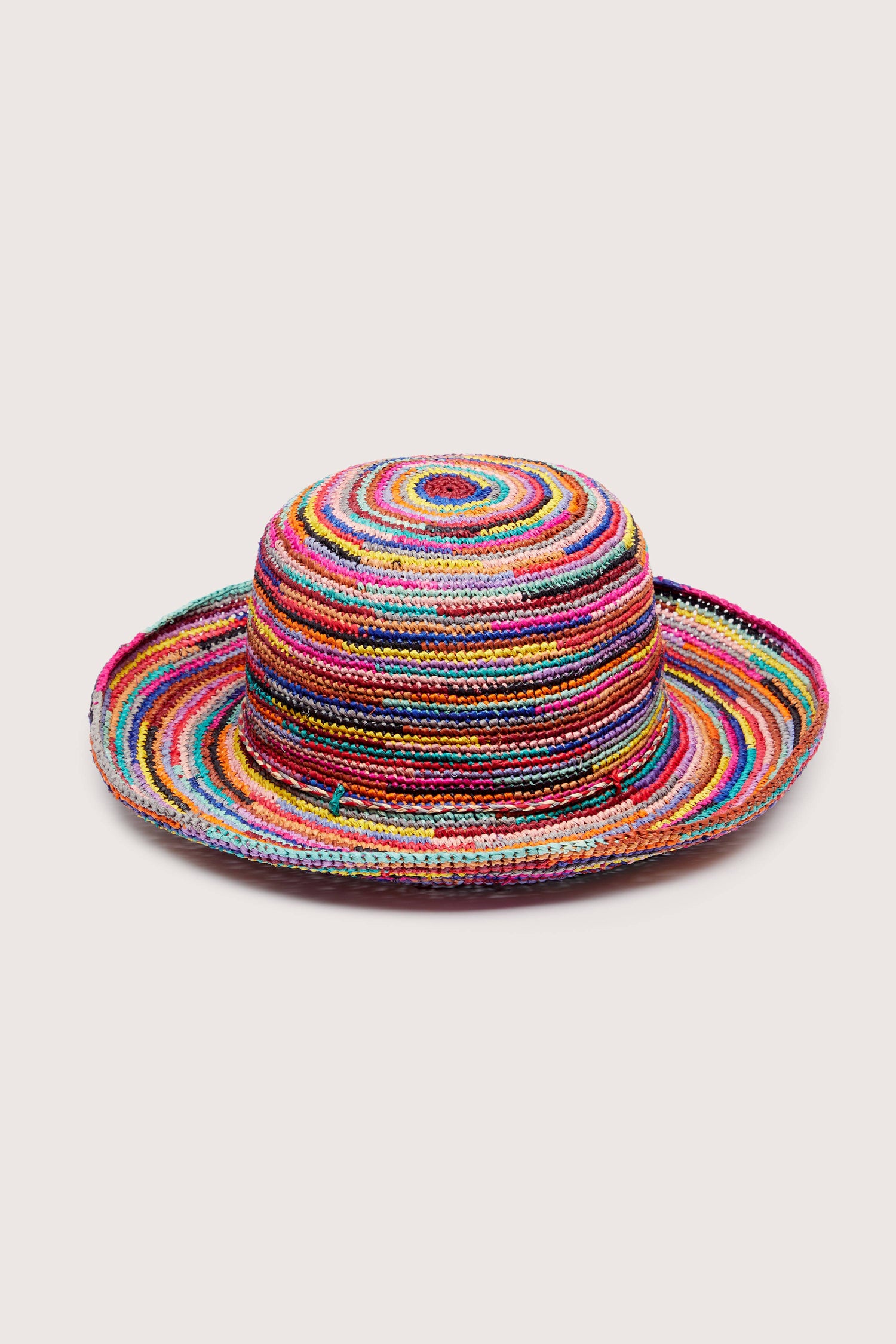 Woven Rainbow Raffia Hat crafted colorful sun hat isolated on a white background.