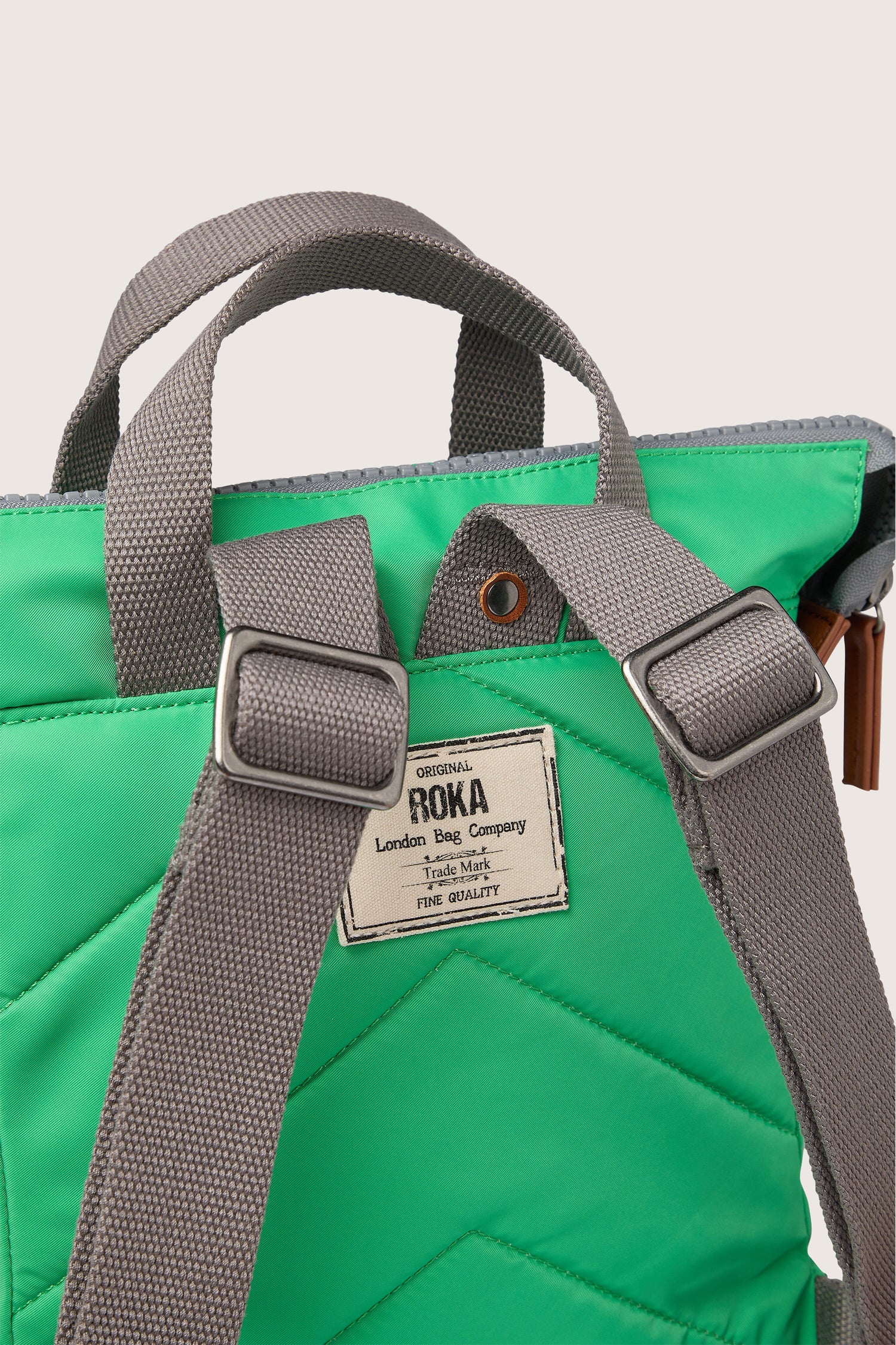 A weather-resistant Recycled Bantry Bag made from recycled nylon with grey straps.