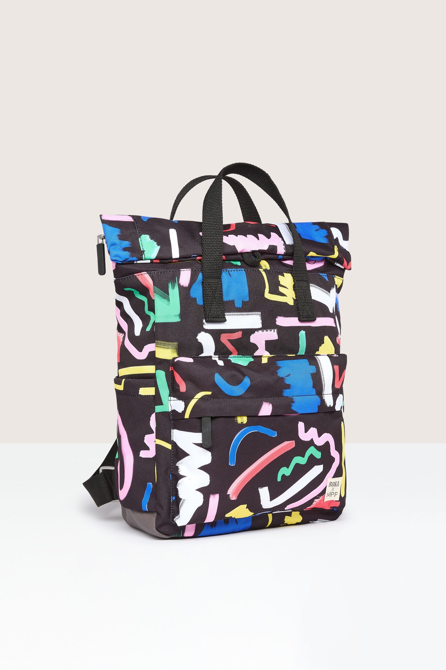 A Recycled Canfield Scribble Print Bag made from recycled bottles with multi-colored splatters.