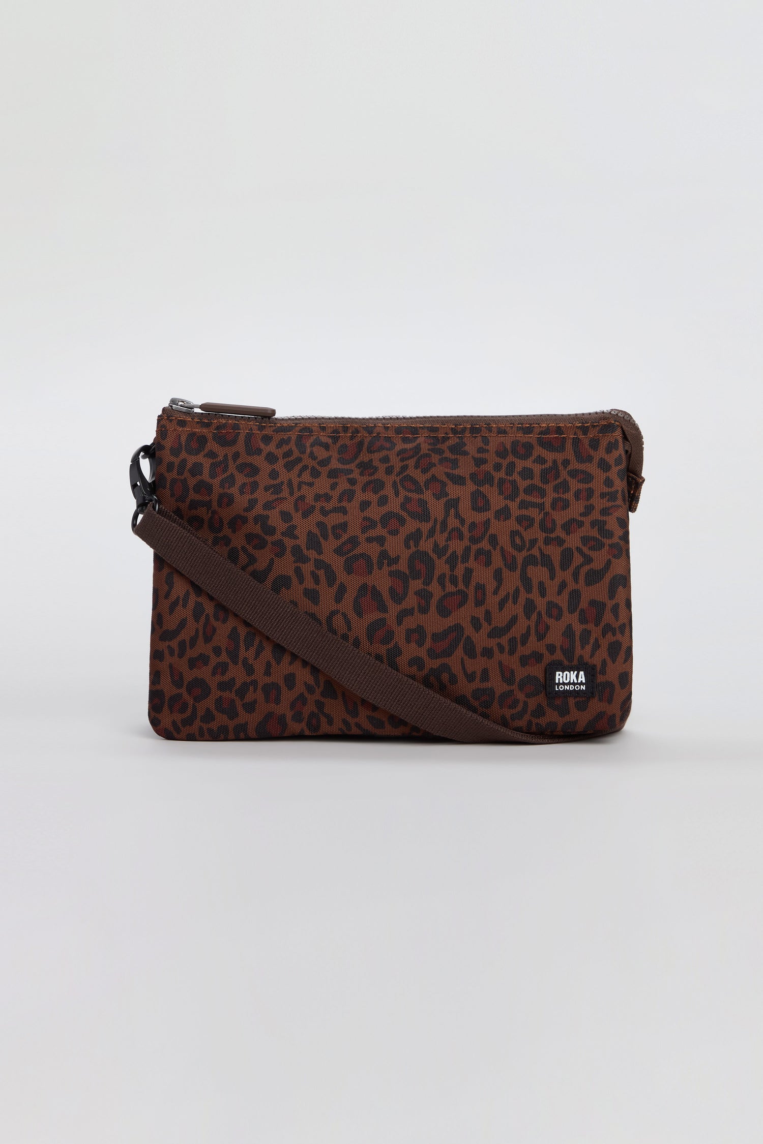 Mini Leopard Carnaby Crossbody Canvas Bag featuring a brown leopard print, zipper closure, and a matching adjustable strap, crafted from recycled canvas and showcased against a plain light background.