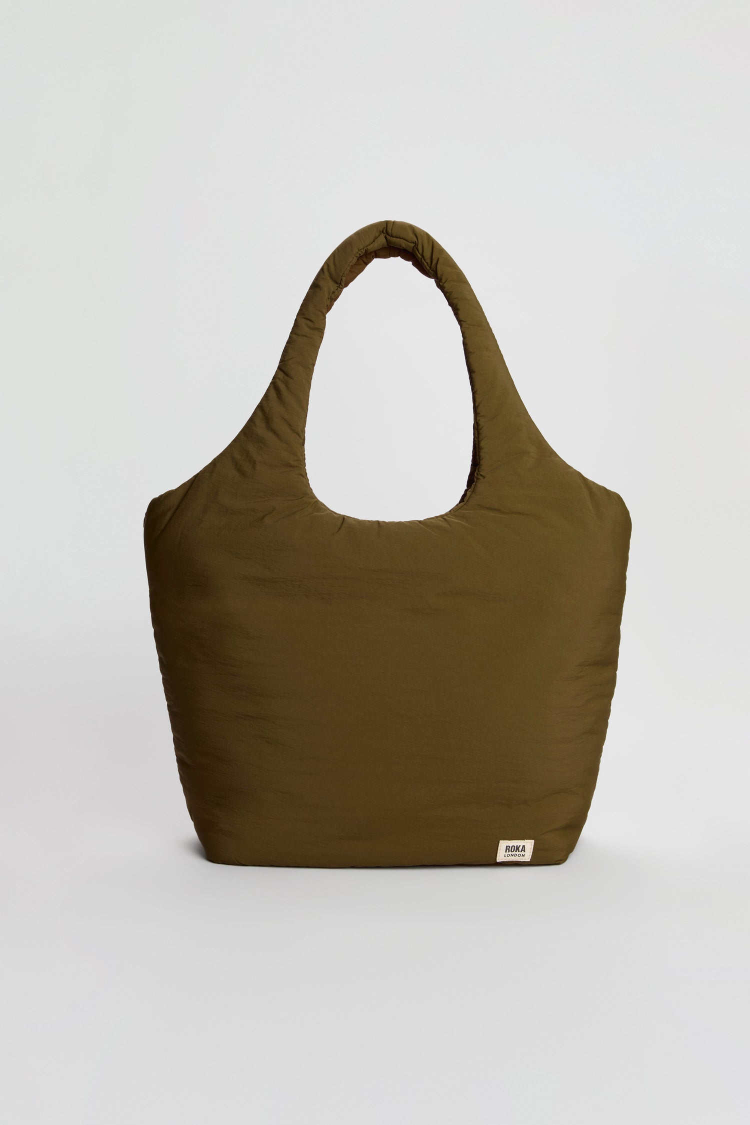 Olive green, puffy Oxford Moss Shoulder Bag with rounded handles and a small white logo tag near the bottom on a plain light background; features a padded laptop sleeve for added convenience.