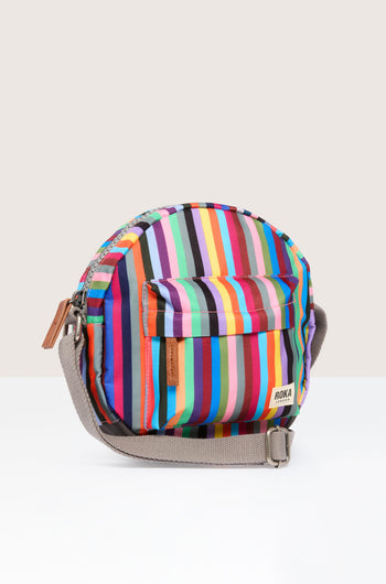 A colorful striped lightweight Recycled Canvas Paddington Bag with a strap.