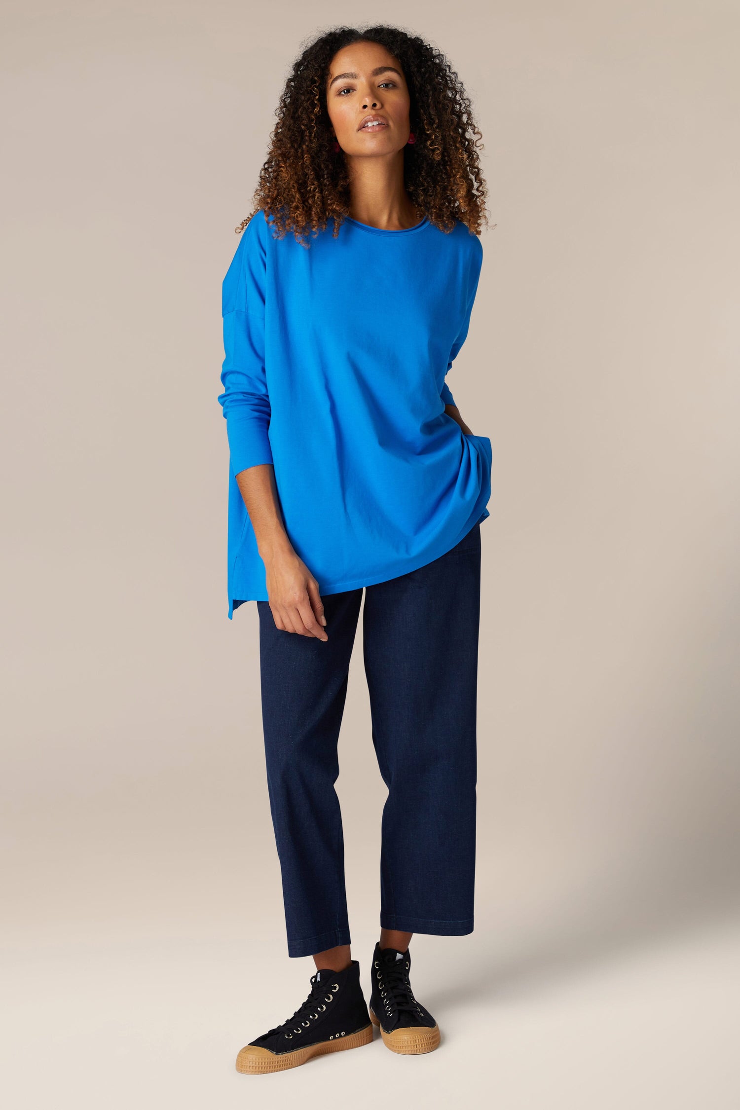 The model is wearing a comfortable Cotton Jersey Relaxed Top from their wardrobe.