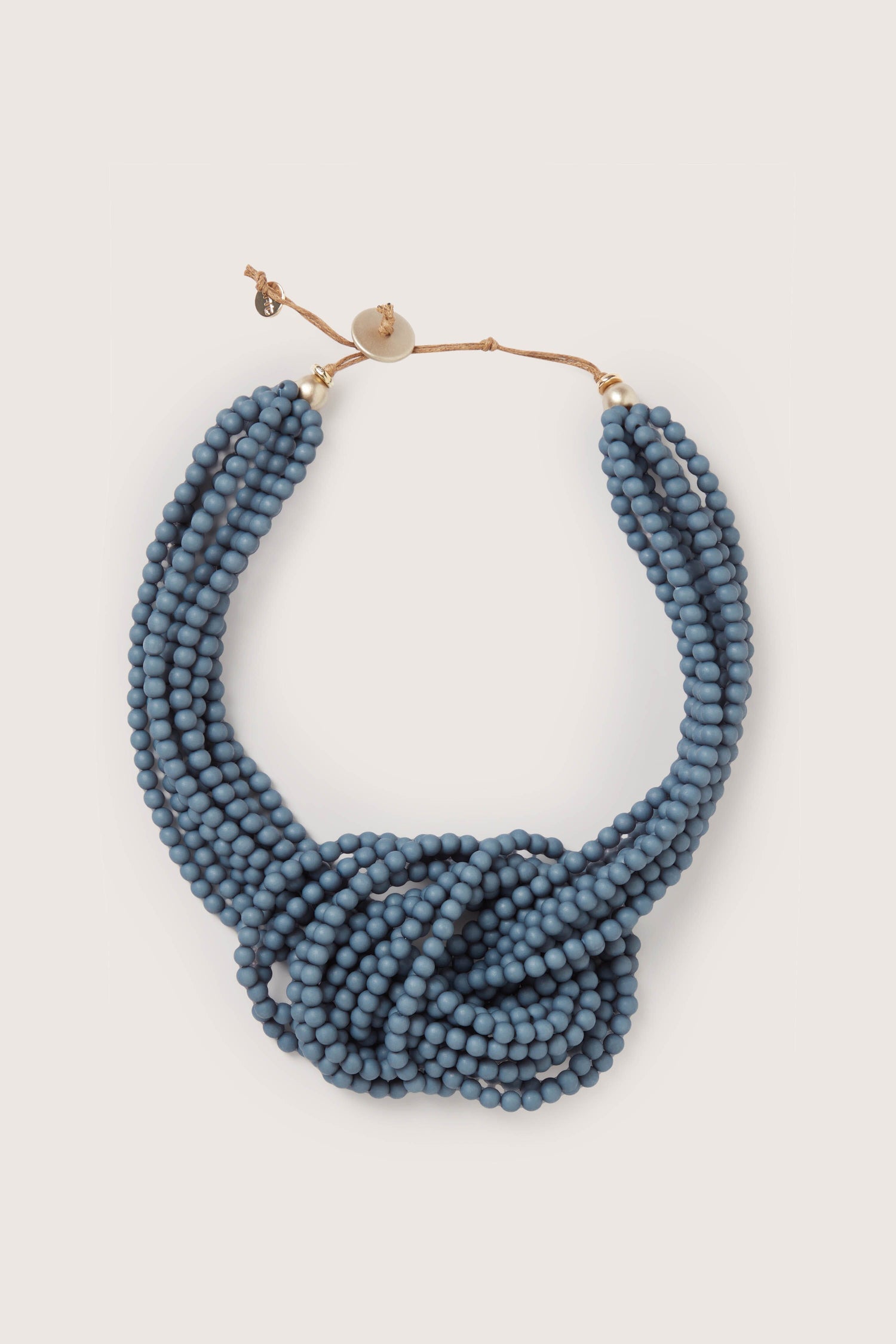 A Knotted Bead Necklace with metallic accents.