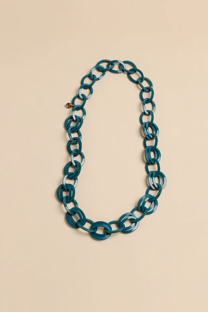 Long Resin Hoop Link Necklace featuring interlocking teal resin hoops in a link style.