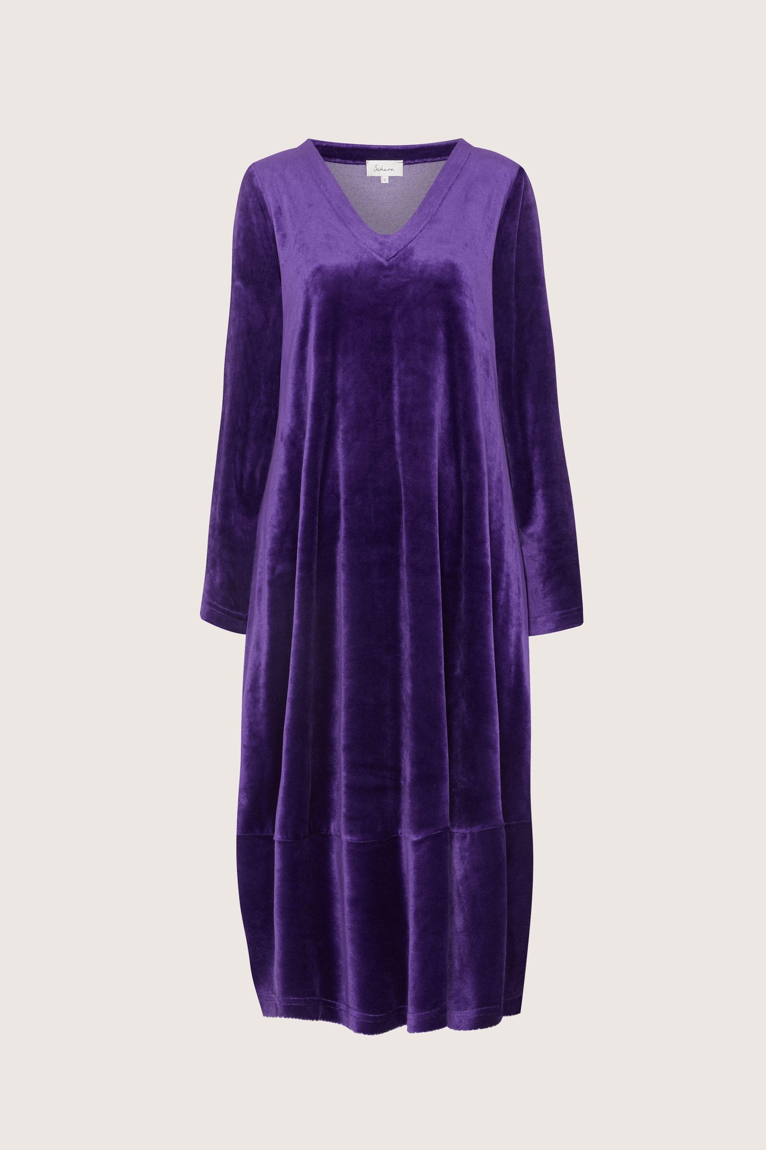 A luxurious Velvet Jersey Bubble Hem Dress on a mannequin.