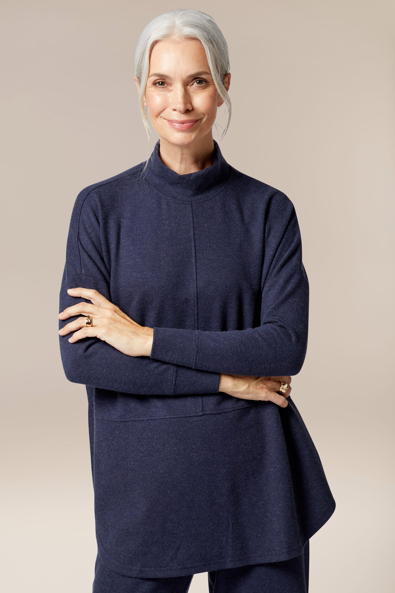 A woman wearing a Marl Jersey Sweatshirt, a wardrobe staple.