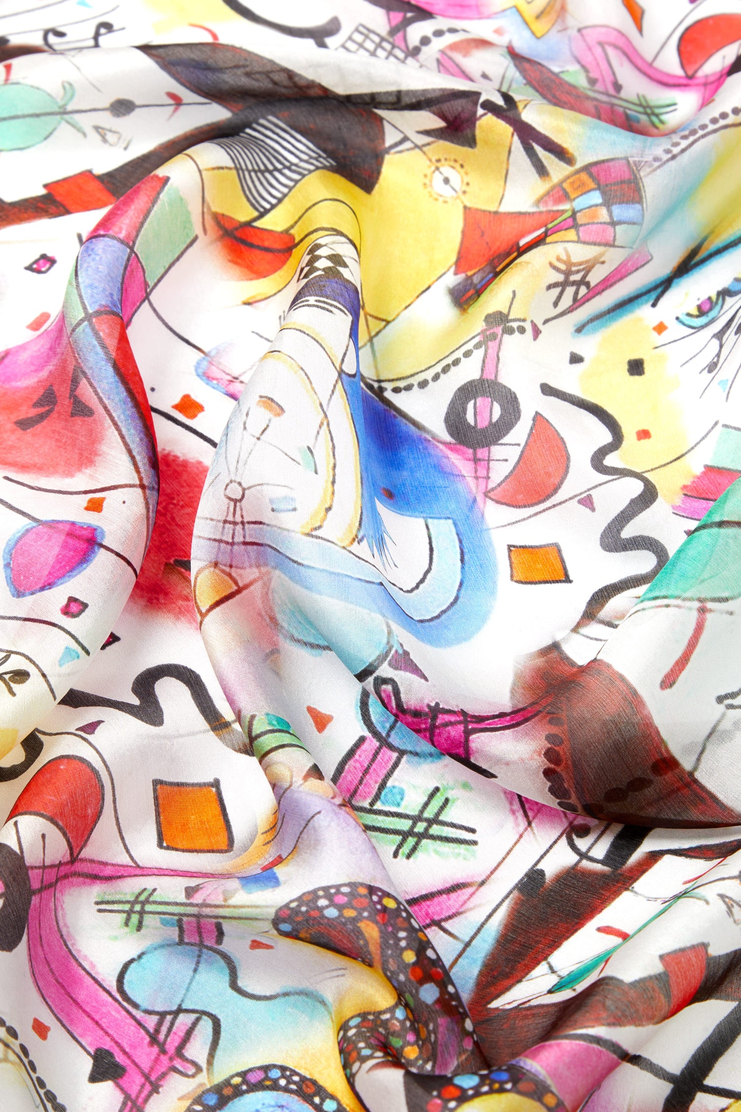 A vibrant Cubist Silk Scarf adorned with cubist-inspired drawings.