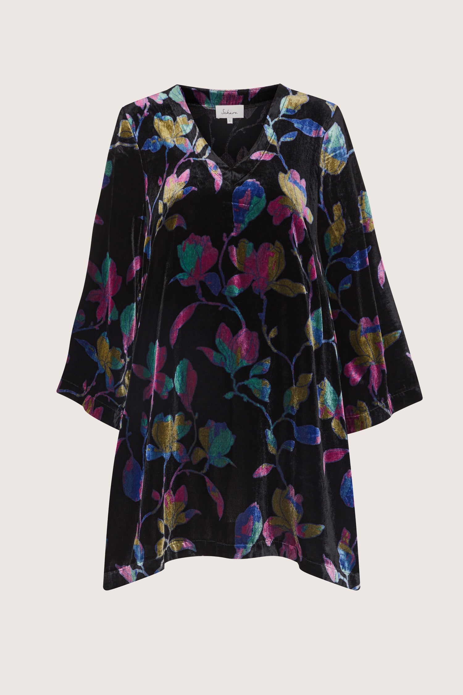 A Winter Magnolia Velvet Tunic with a Winter Magnolia floral print.