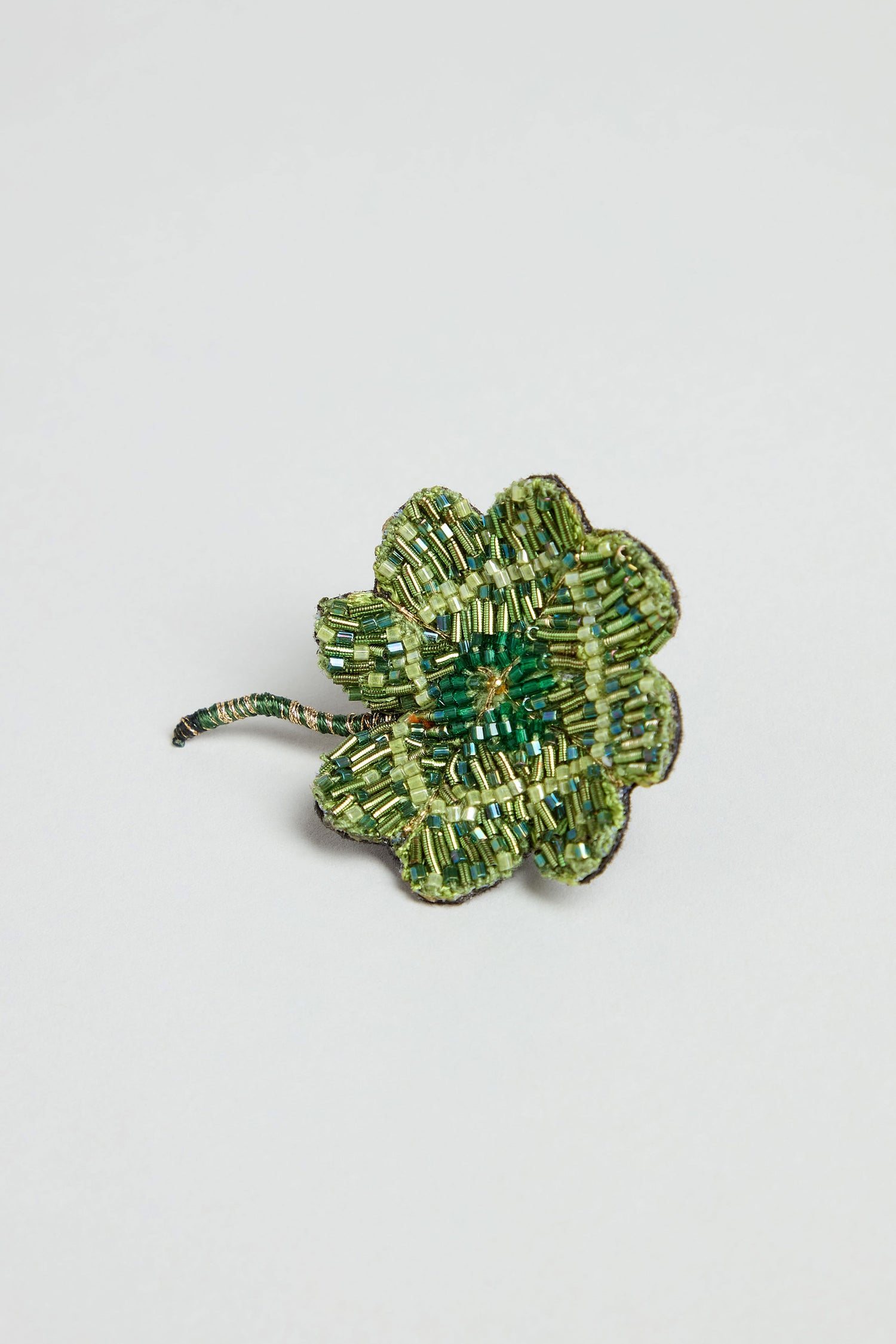 Hand Beaded Vintage Clover Brooch, featuring a beaded green four-leaf clover design, beautifully displayed on a plain white background.
