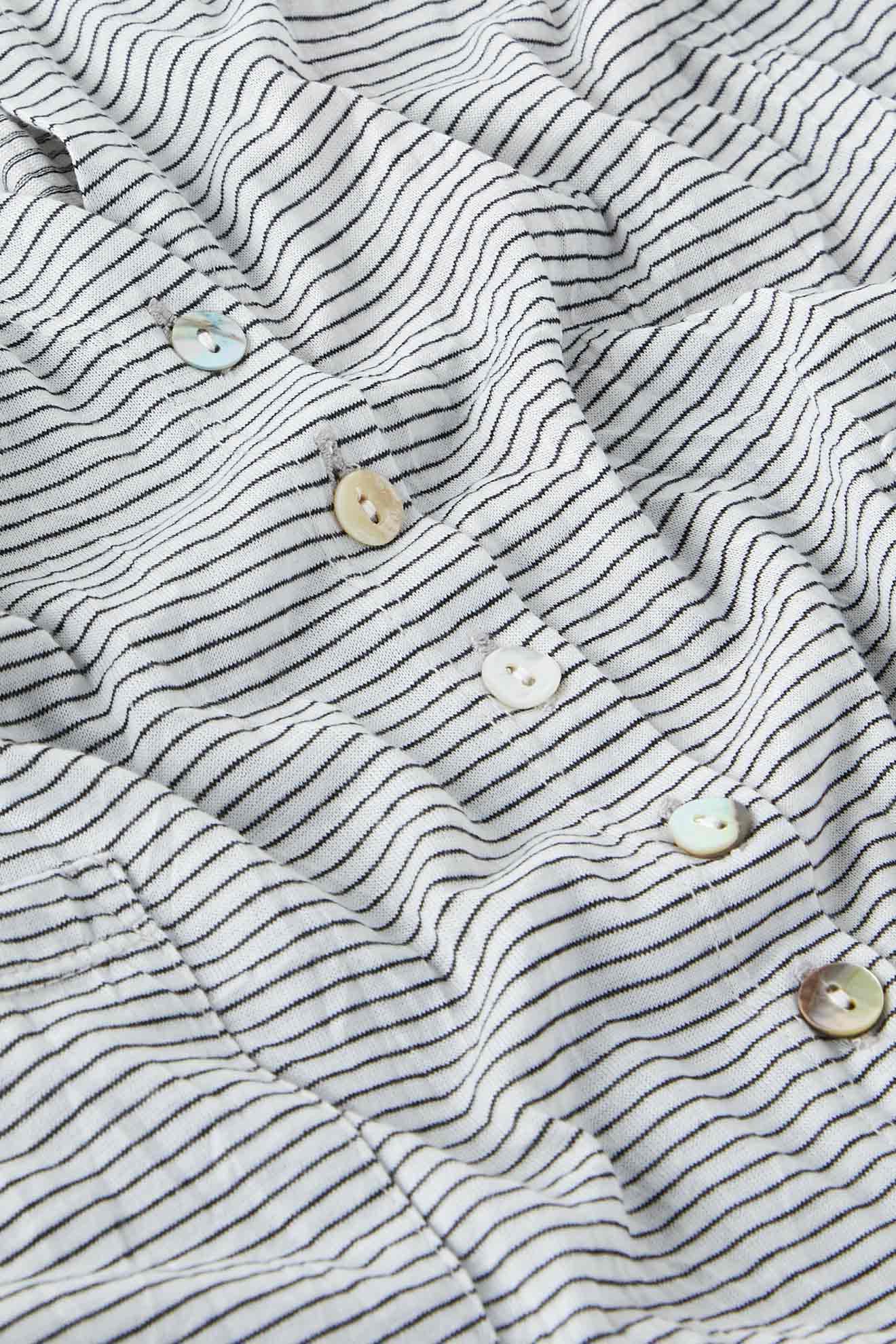 Close-up of a Stripe Button Cardi with pinstripe design and button details.
