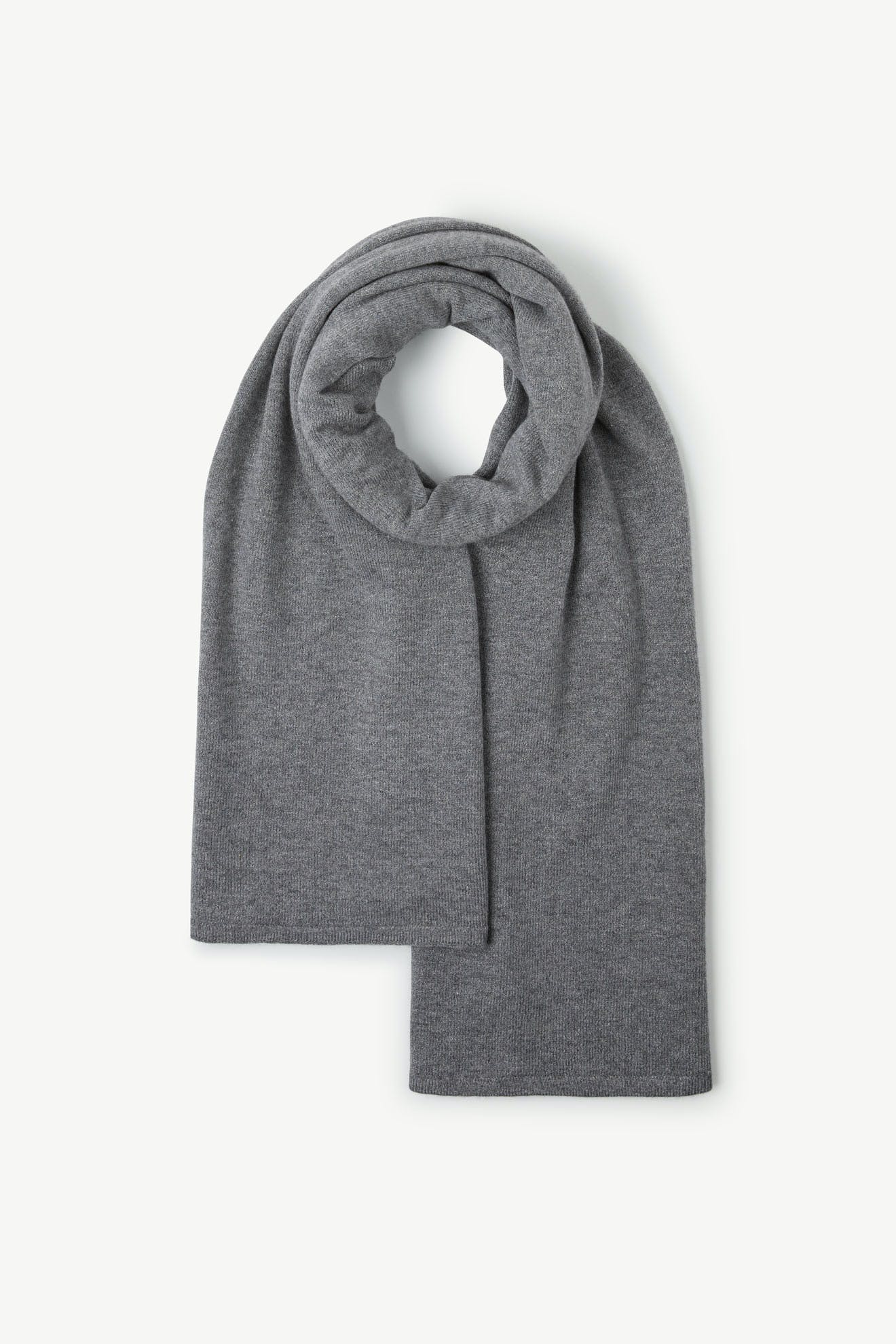 A neatly folded Knit Scarf in grey is displayed on a plain white background.