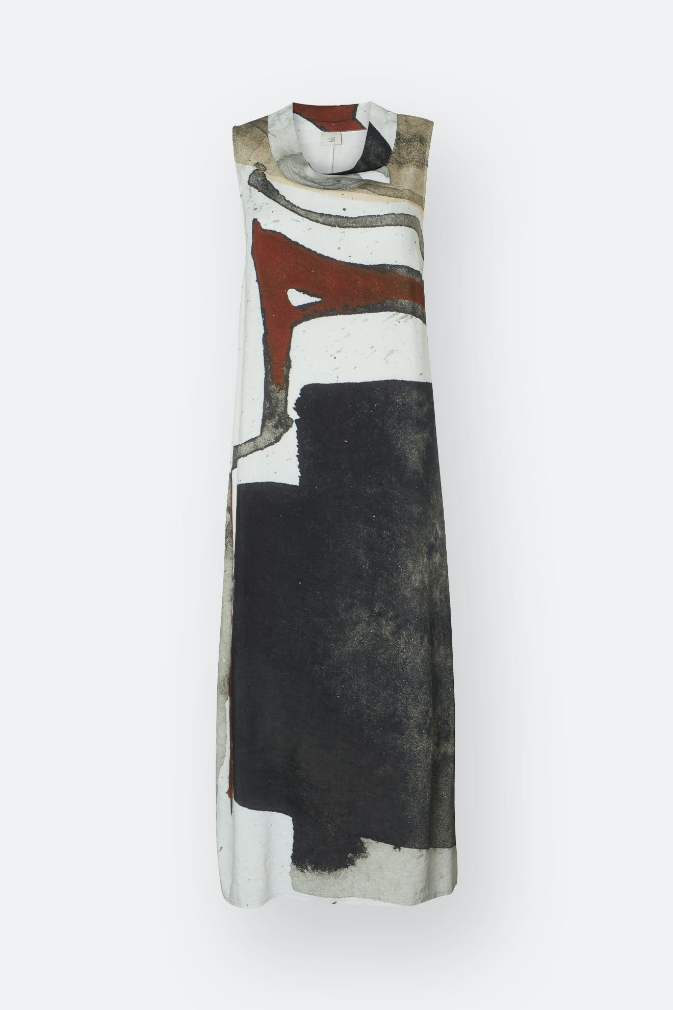 A cowl print dress with an abstract pattern in black, white, and red, displayed against a white background.