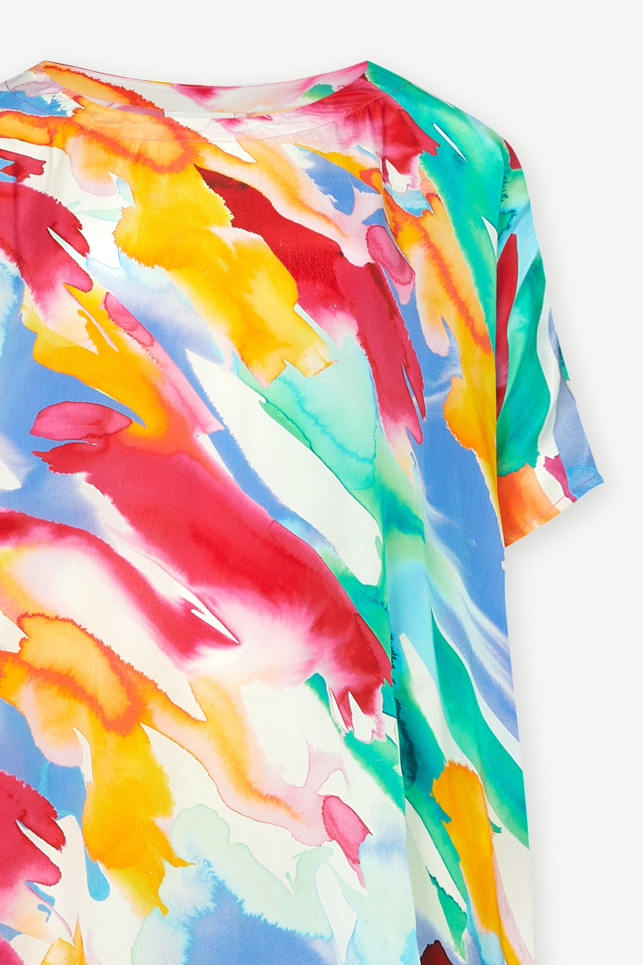 Close-up of a Rainbow Splash Viscose Tunic featuring vibrant red, blue, yellow, and green tones.