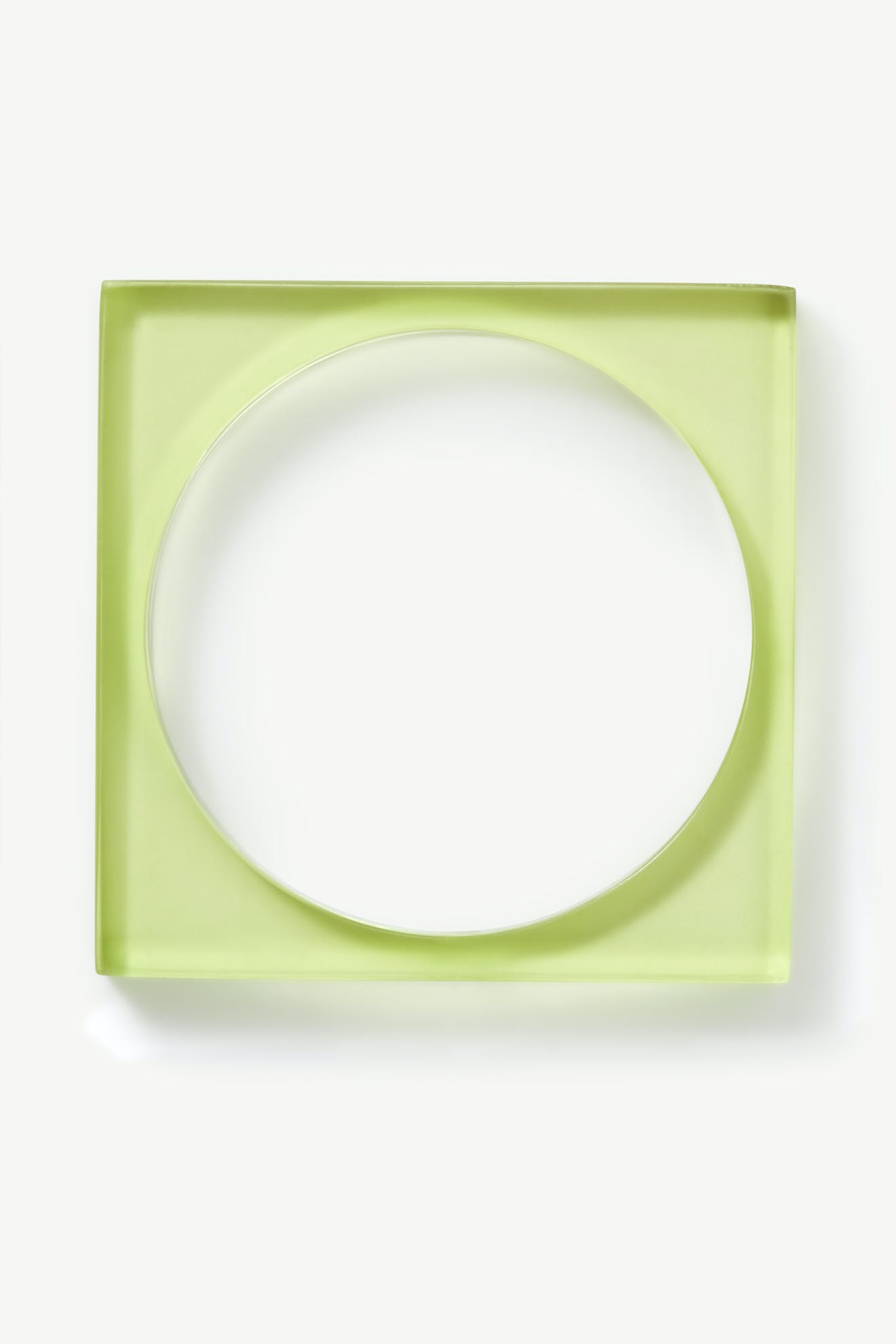 Square Bangle: A translucent green square bangle with a large circular cutout in the center, shown on a white background.