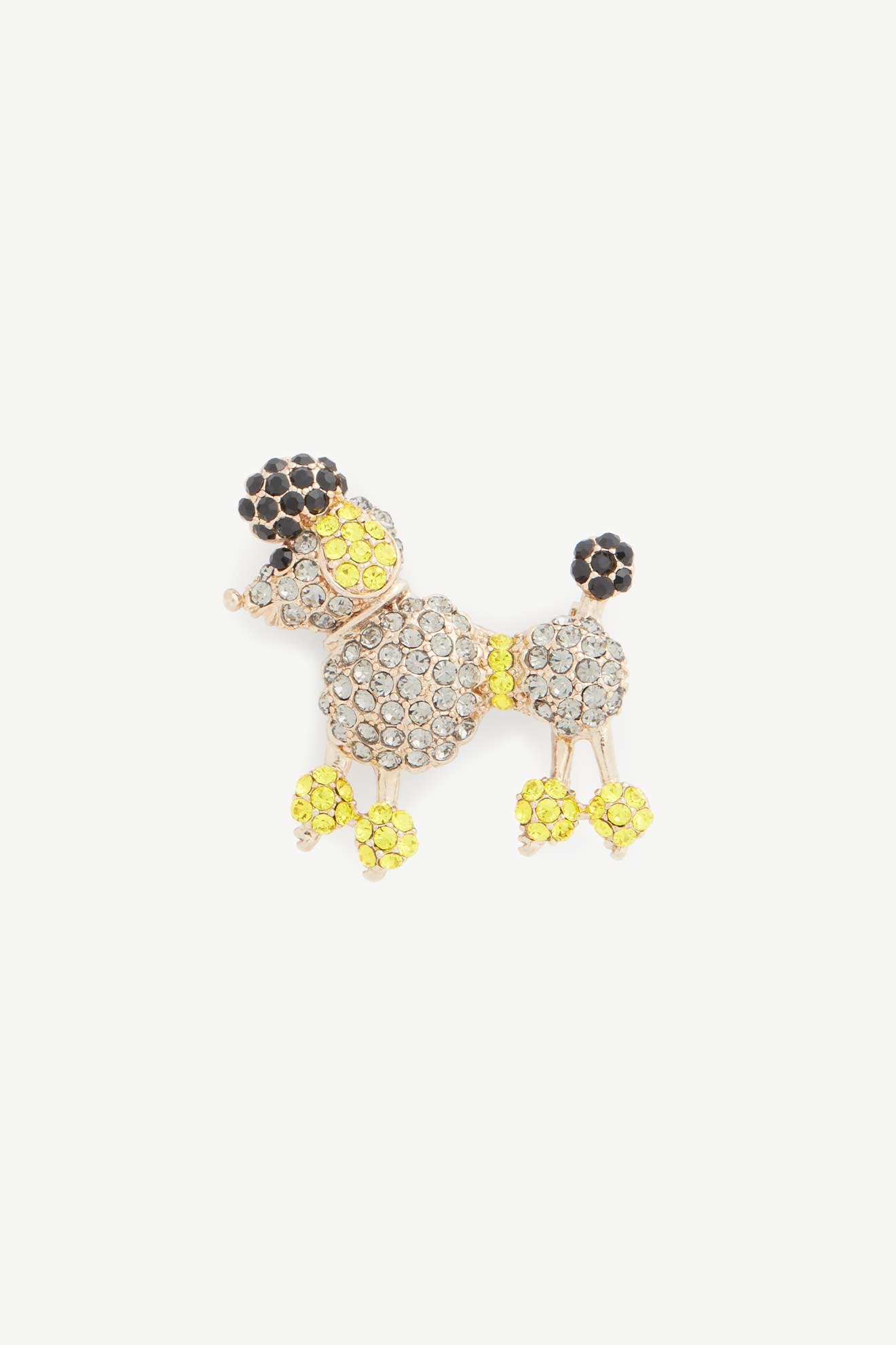 Poodle Brooch: Gold and silver rhinestone poodle with black stones for ear and tail, yellow accents on feet, topknot, muzzle—great for whimsical jewelry lovers.